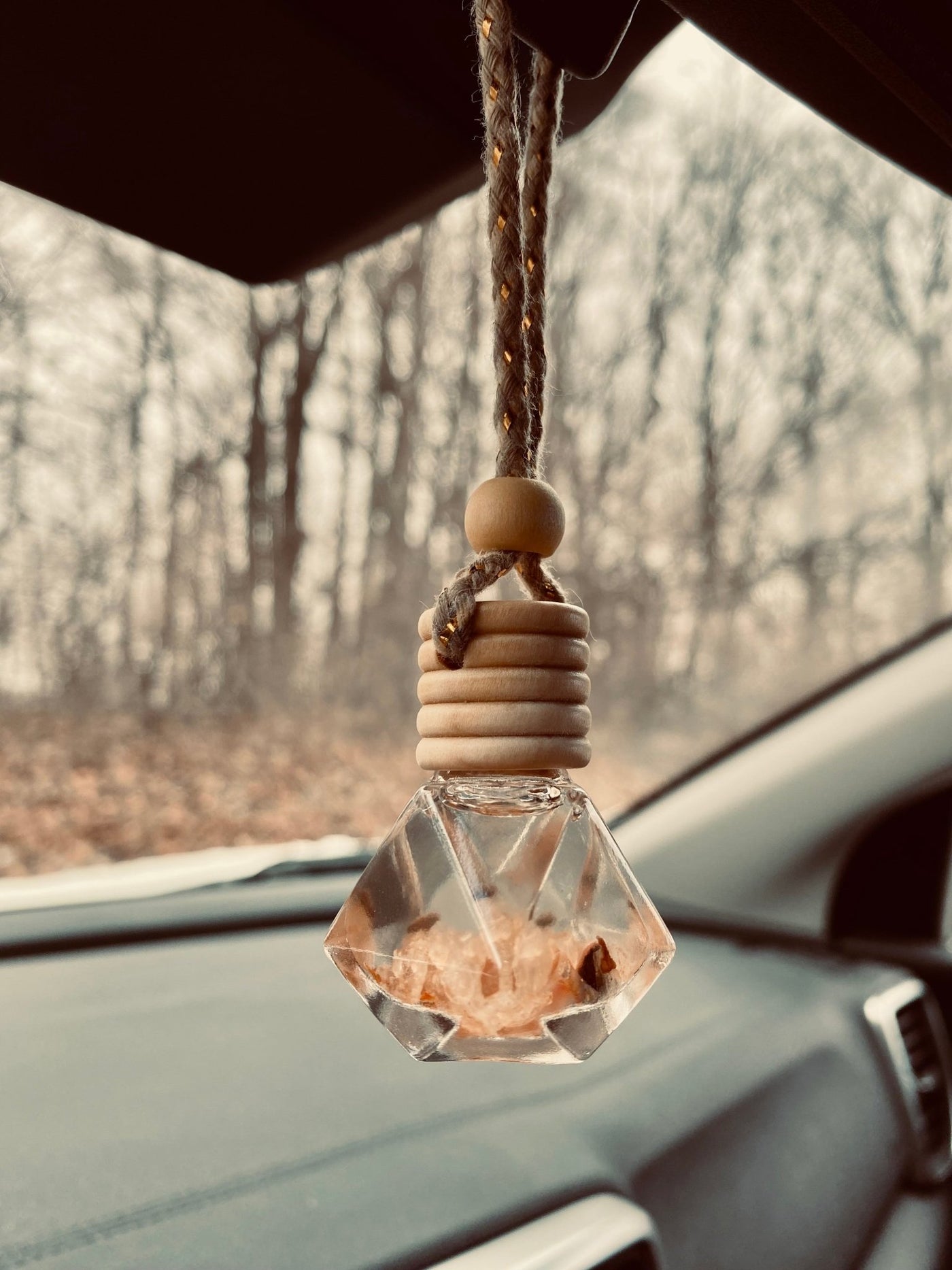 Small Glass Bottle With Car Perfume Hanging In The Car Beautiful
